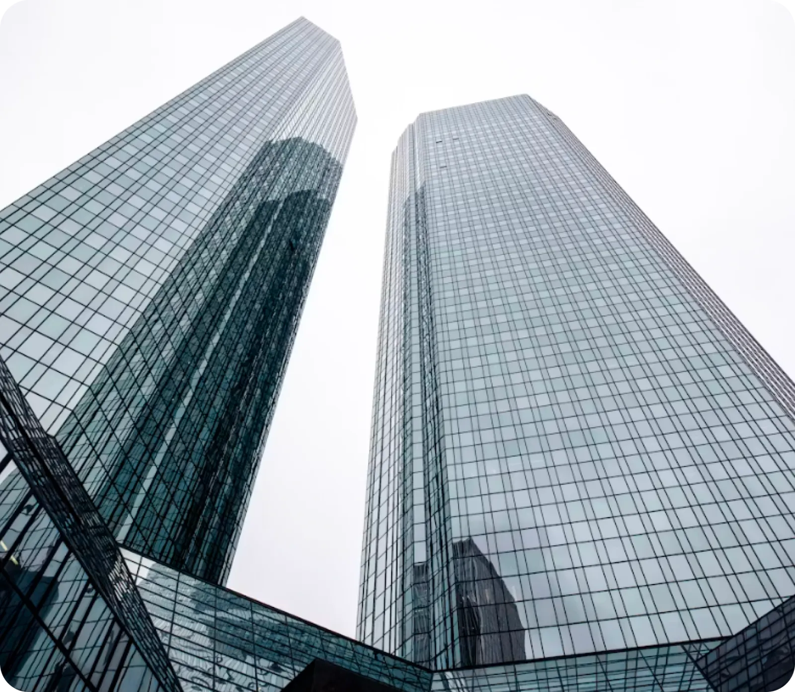 Glass office towers seen from below
