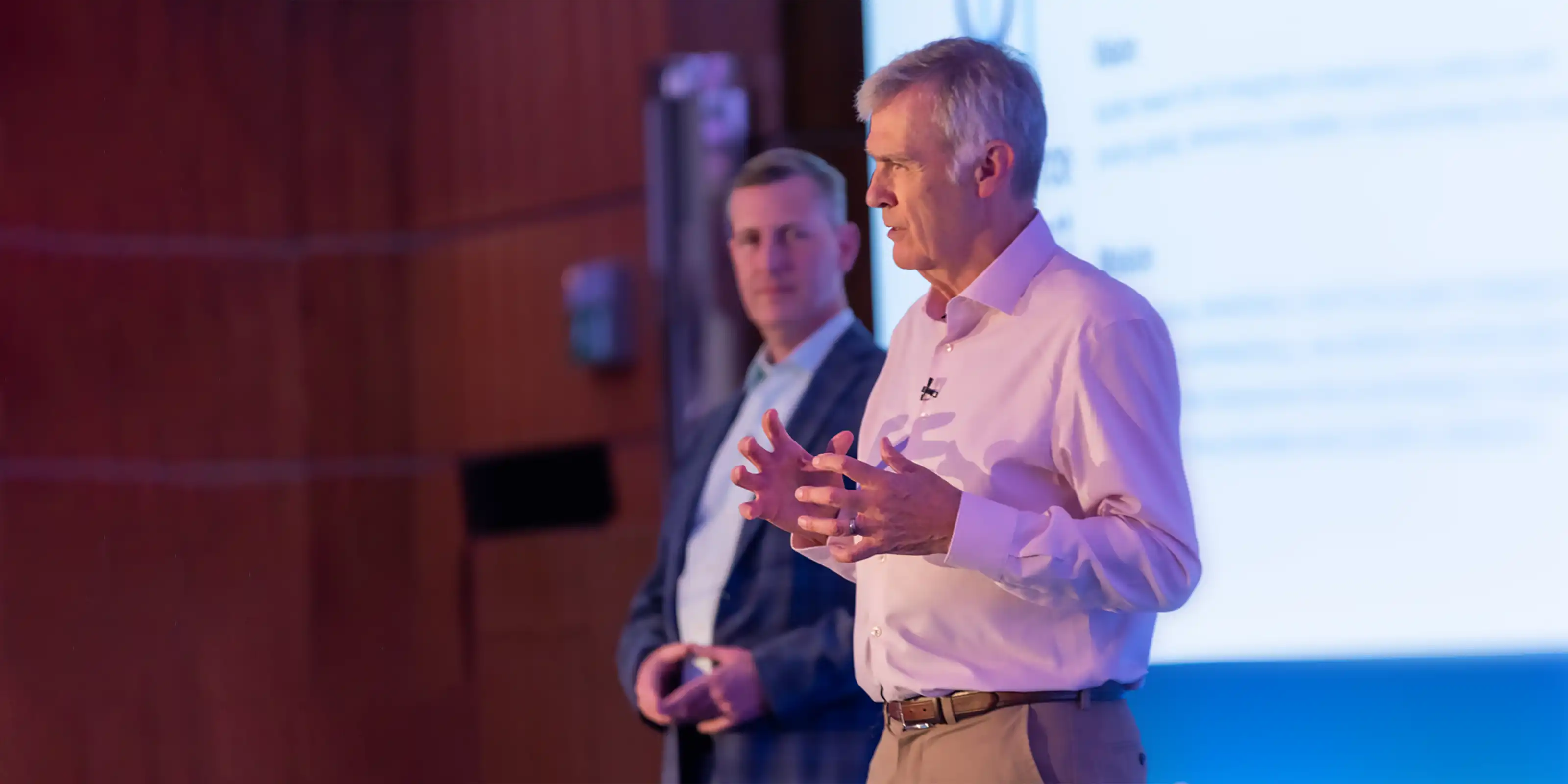 Representatives of founding partner organizations on conference stage