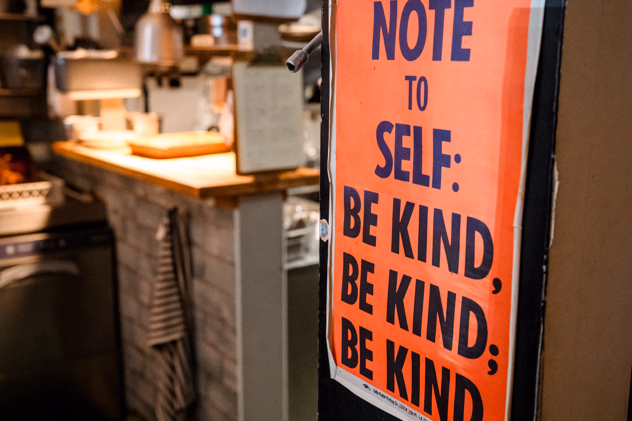 Pig & Pastry poster in restaurant "NOTE TO SELF: BEKIND, BE KIND, BE KIND."