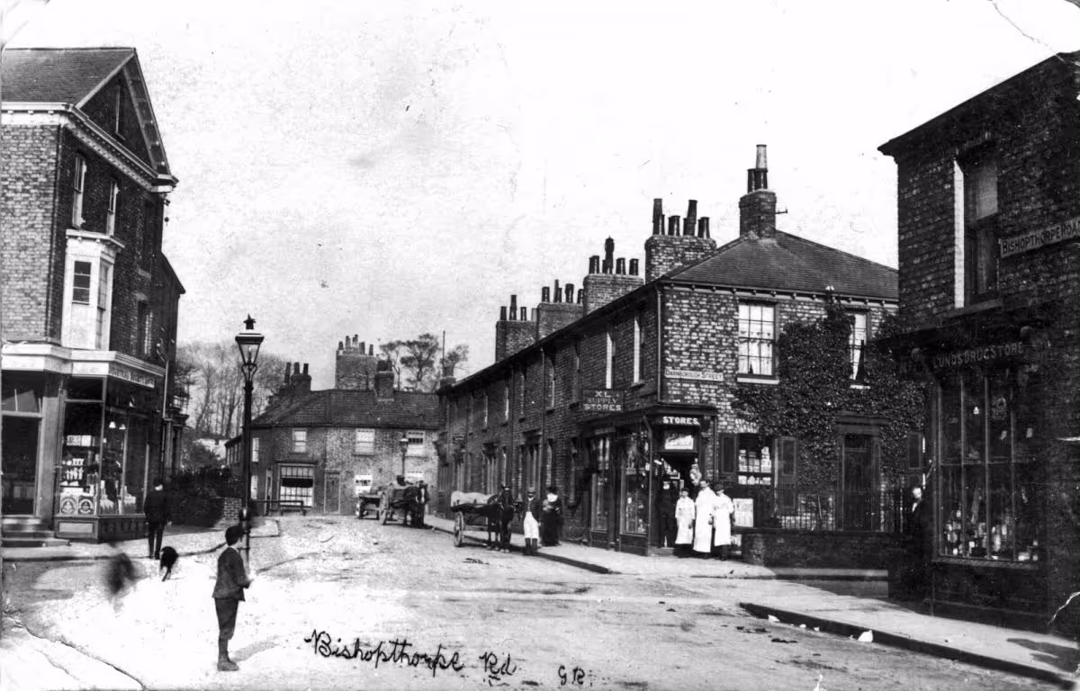 Historic photo of Bishopthorpe Road shops from 1900s