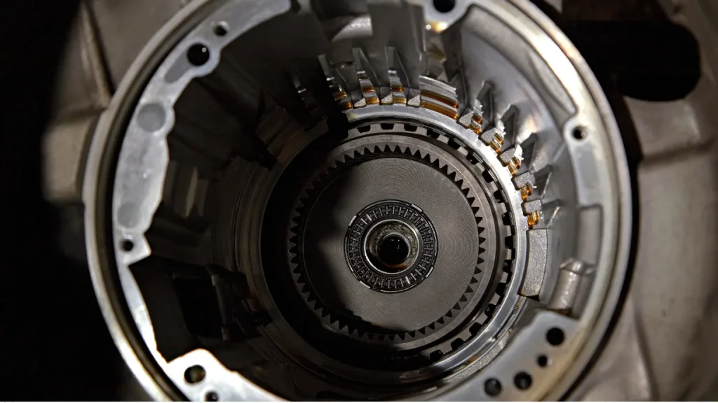 Inside view of a transmission housing, highlighting intricate parts for repair and service