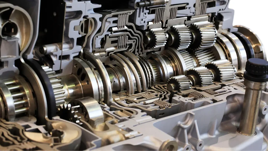 Detailed cross-section of a transmission system with visible gears, suitable for automatic transmission repair demonstrations