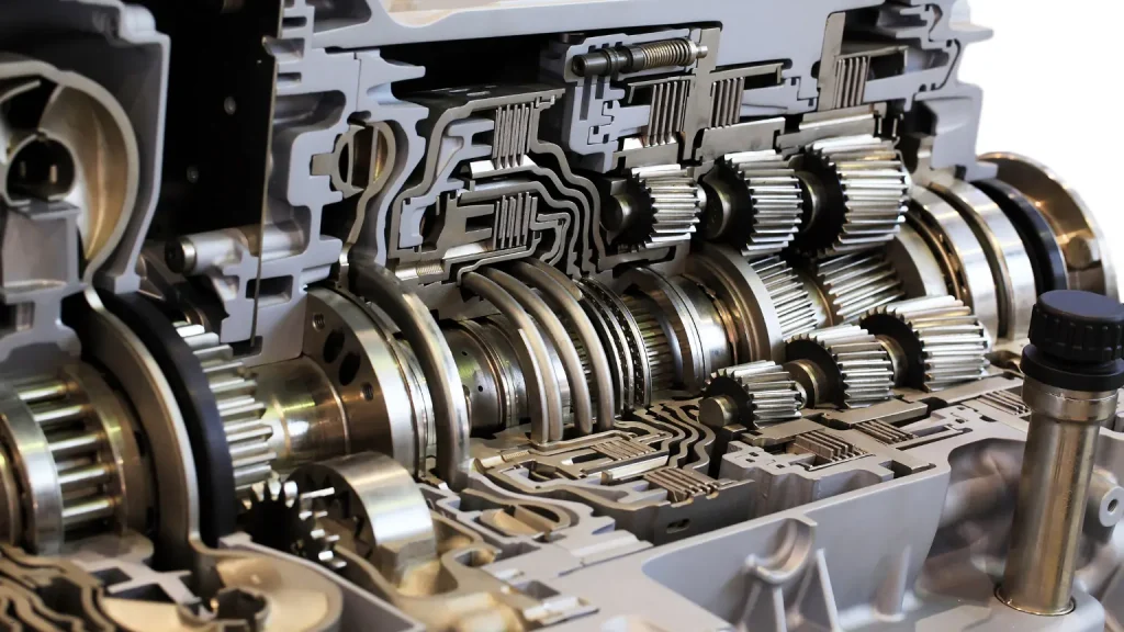 Detailed internal view of a car transmission system highlighting intricate gears and mechanisms