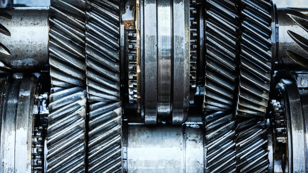Industrial-grade helical gears inside a mechanical transmission system for heavy-duty applications