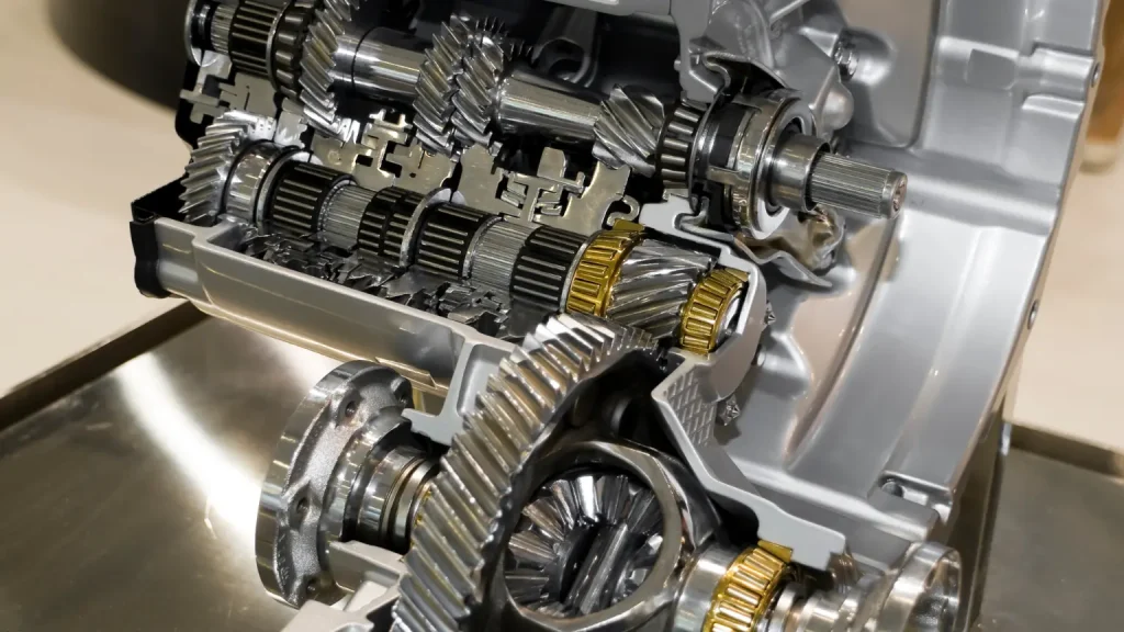 Automatic transmission repair shown in a detailed cutaway view of an internal gear system with helical gears and shafts