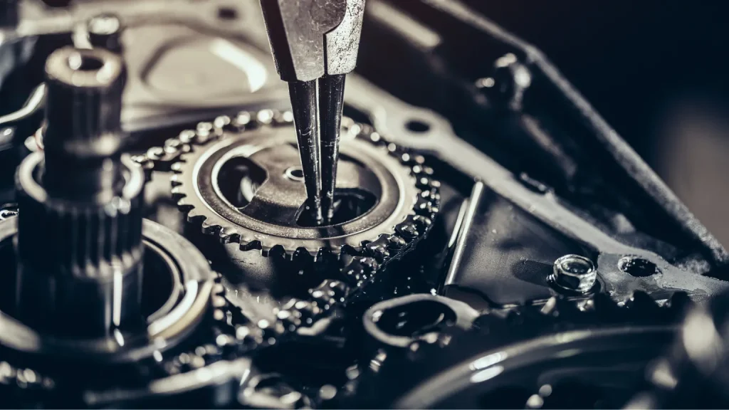 Quick transmission repair in progress with a detailed cutaway view of an automatic transmission, highlighting internal gears and components.
