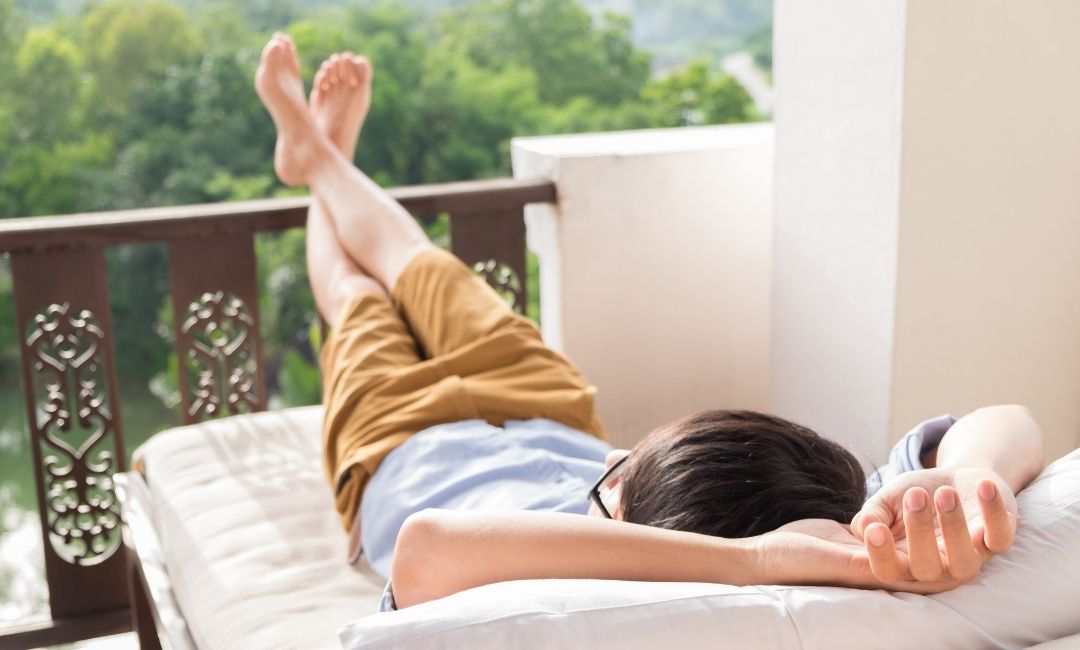 Person resting in a balcony