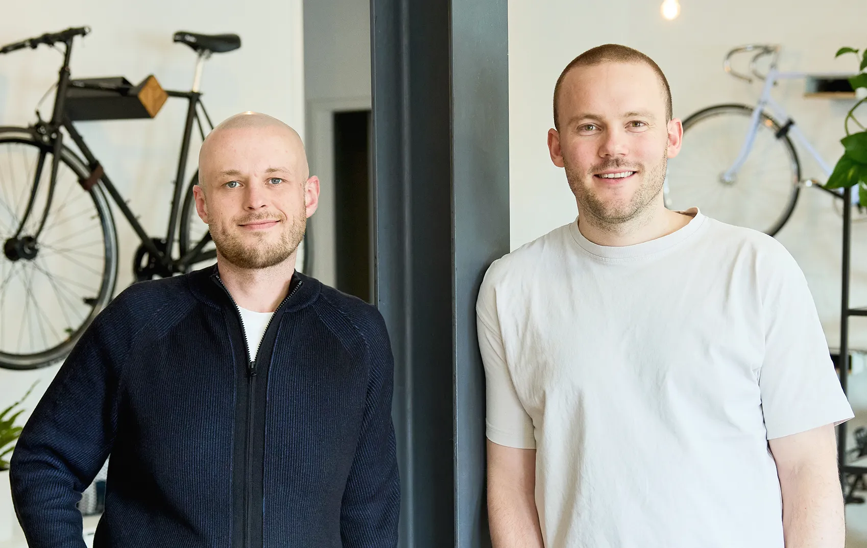Sergei and Mark standing in office
