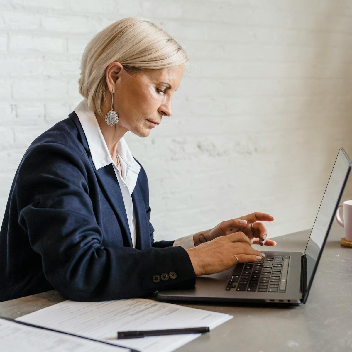 Valuer valuing property using a laptop computer
