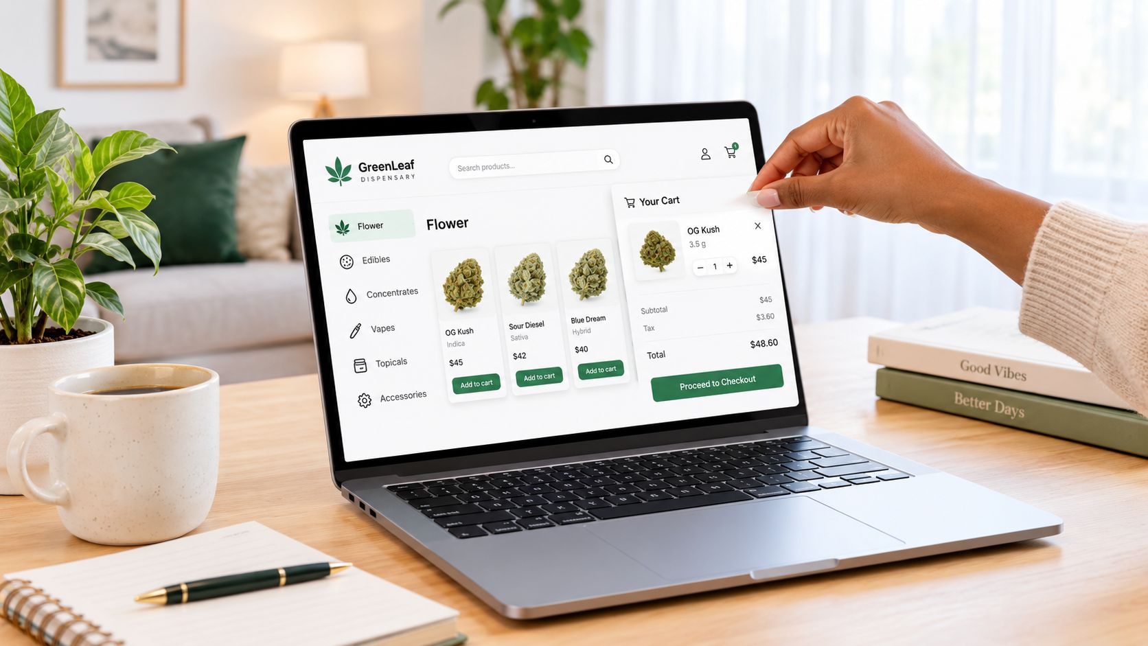 A person using a laptop to order cannabis products from an online dispensary website at a desk.