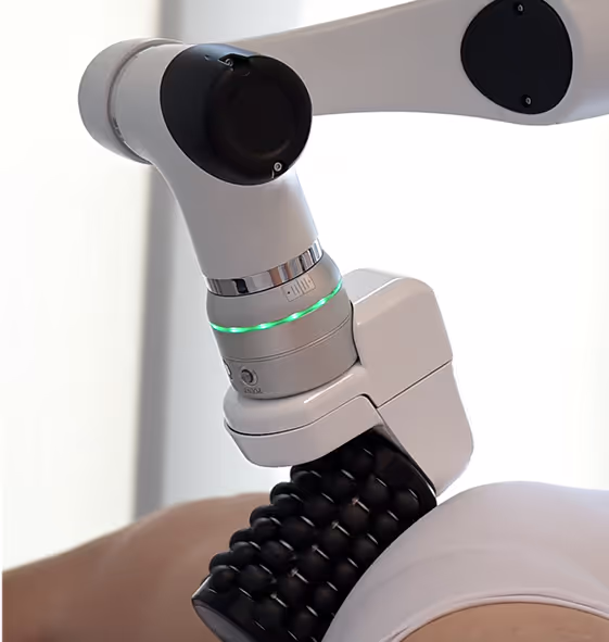 A close up of a person with a robotic arm.
