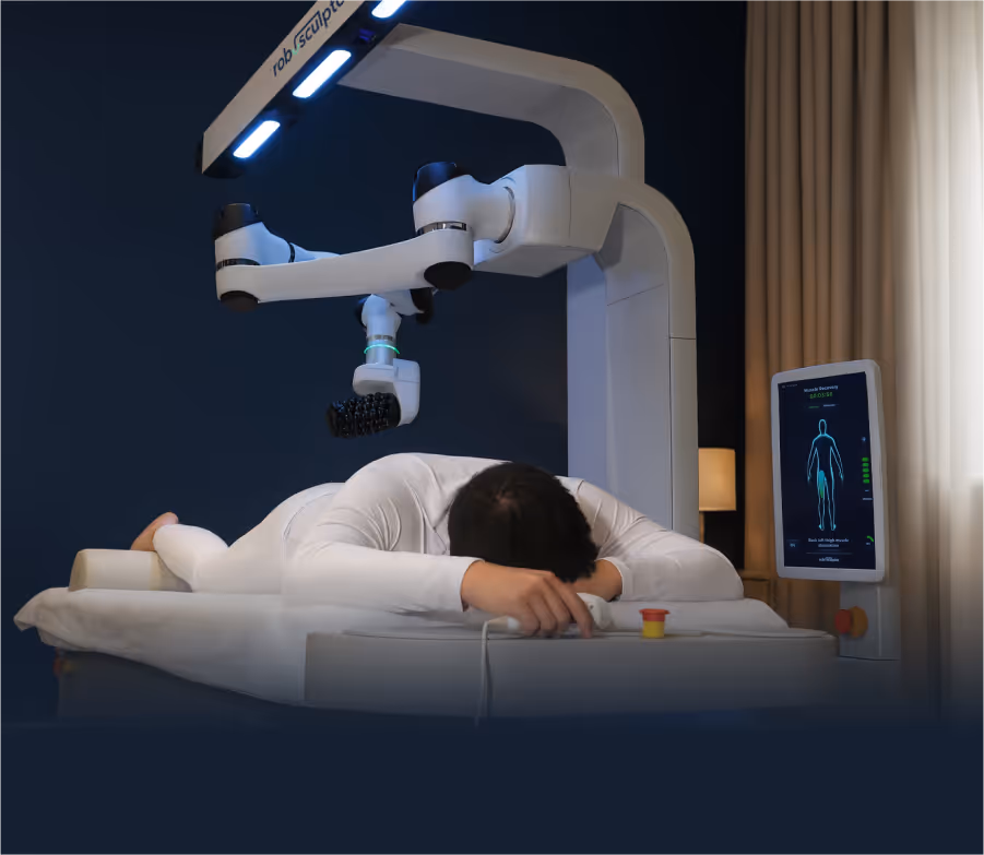 Man laying on roboSculptor getting a massage