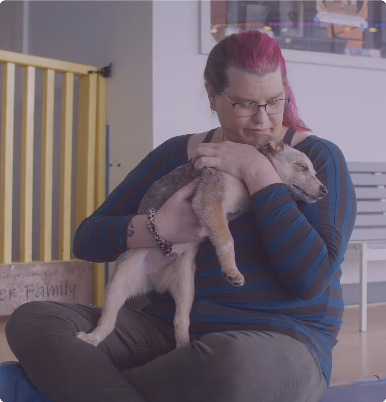 Photo of women holding a puppy