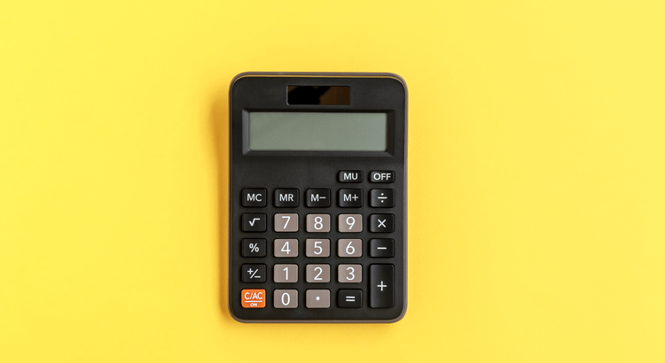 Black calculator on a yellow background