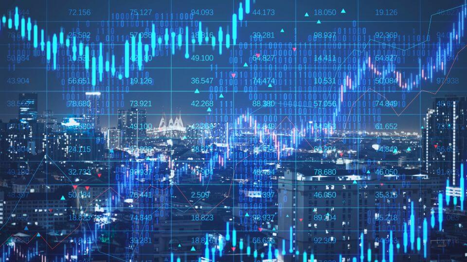 Birds eye view of a city with a transparent finance dashboard overlay