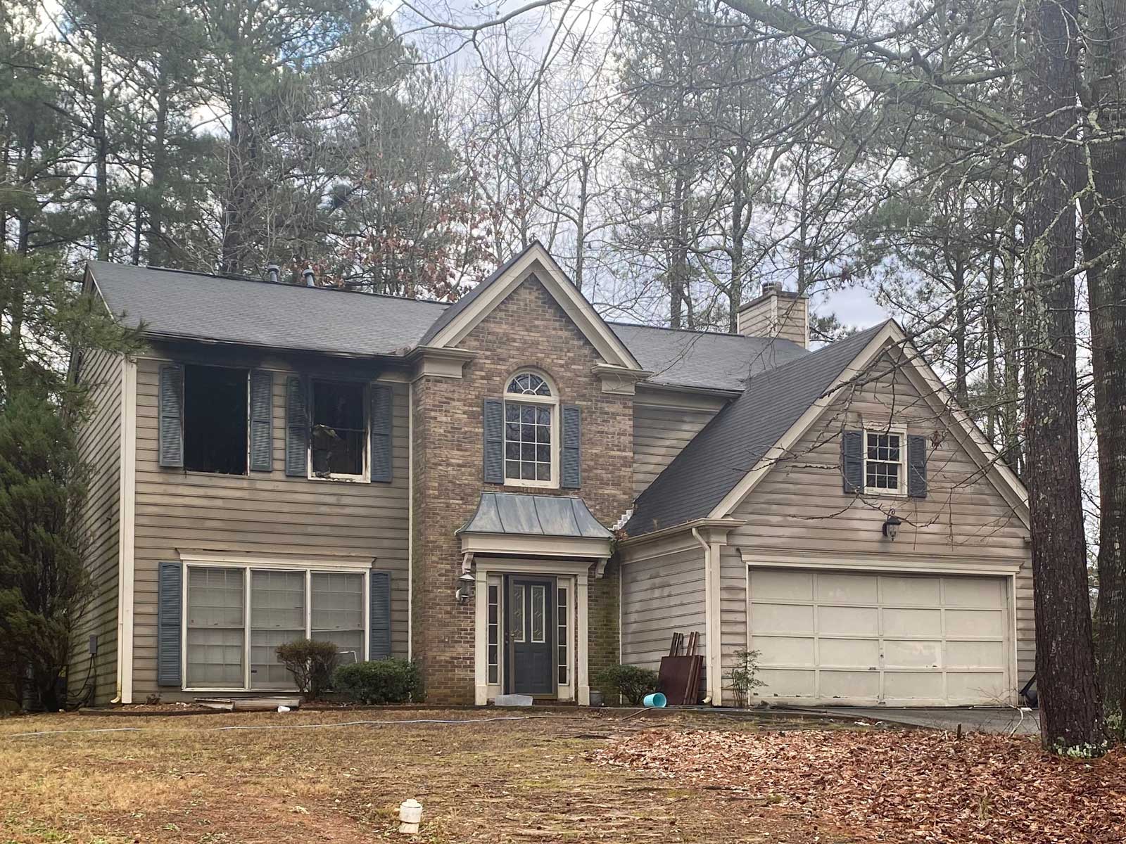 BEFORE Pic of Front of House that was burned from the inside. Showing the state of a home before NDRMI gets involved