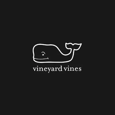 Whale logo with a smiling face and the text "vineyard vines" below it.