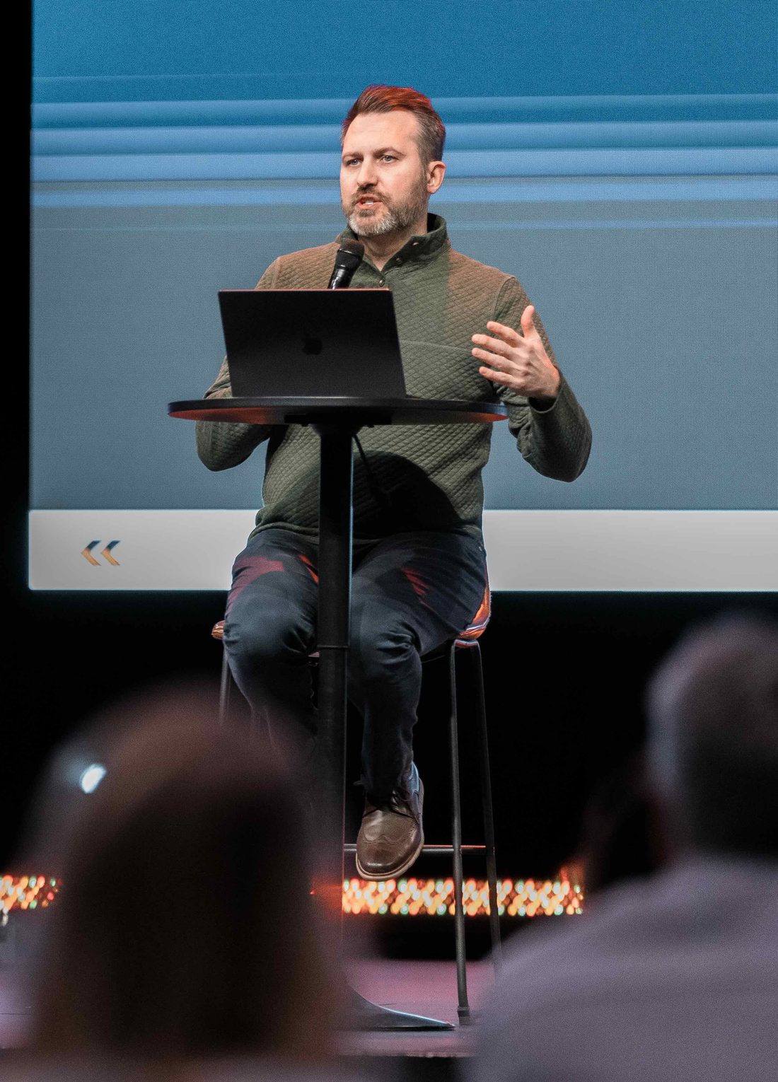 Josh Roberie teaching pastors from the stage at a Build the Church event