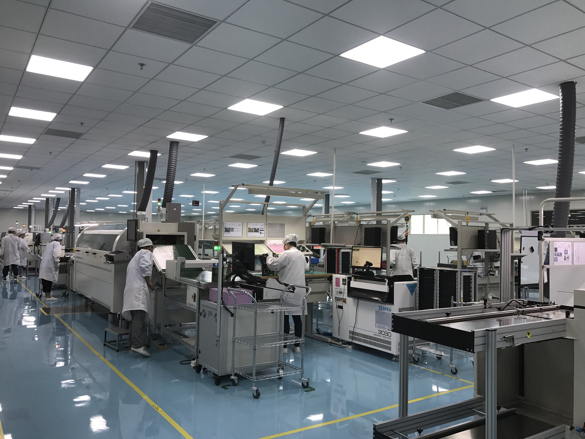 Operators and electronics production equipment at P4Q