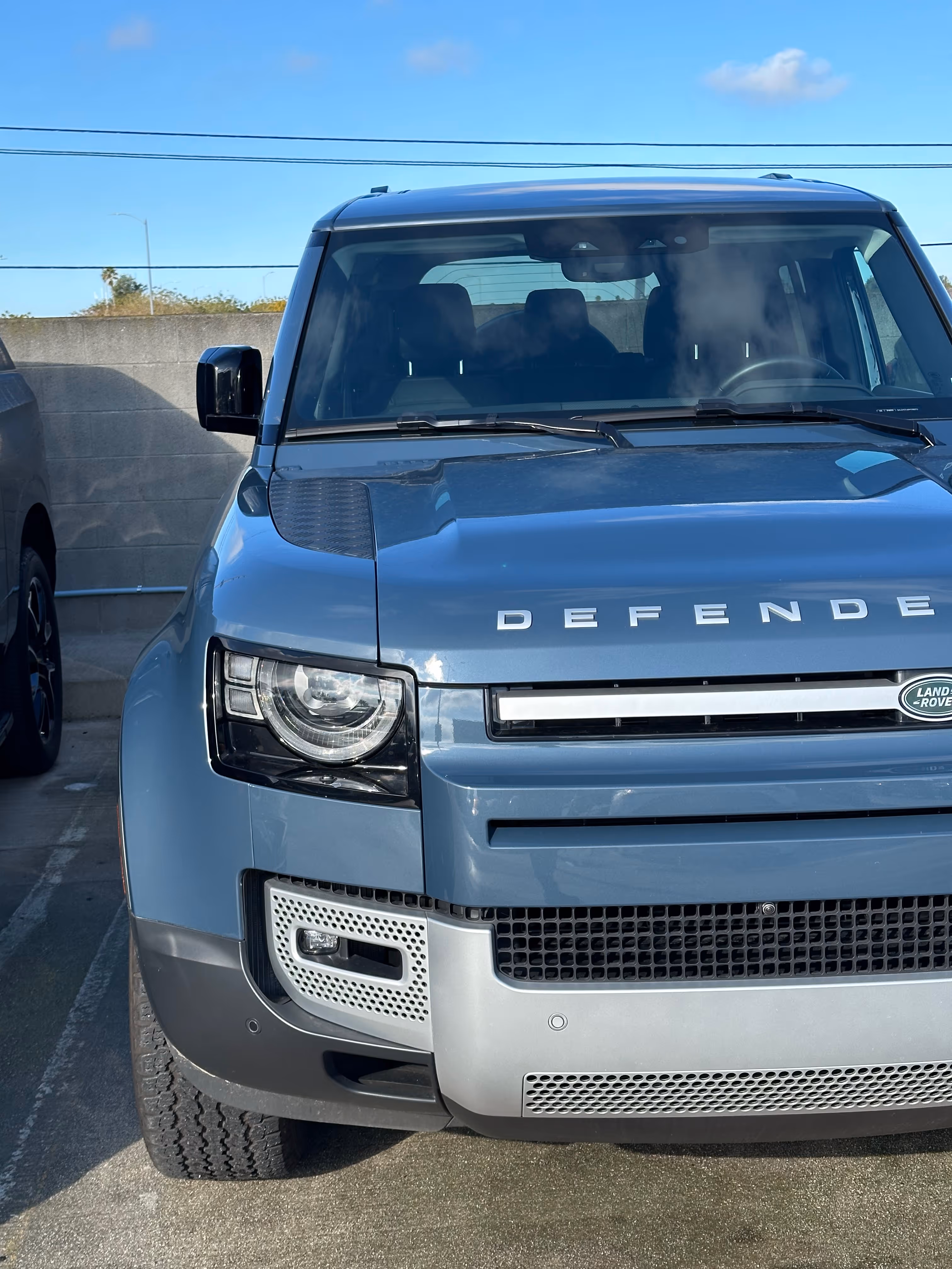 Defender car parked outdoors on the street