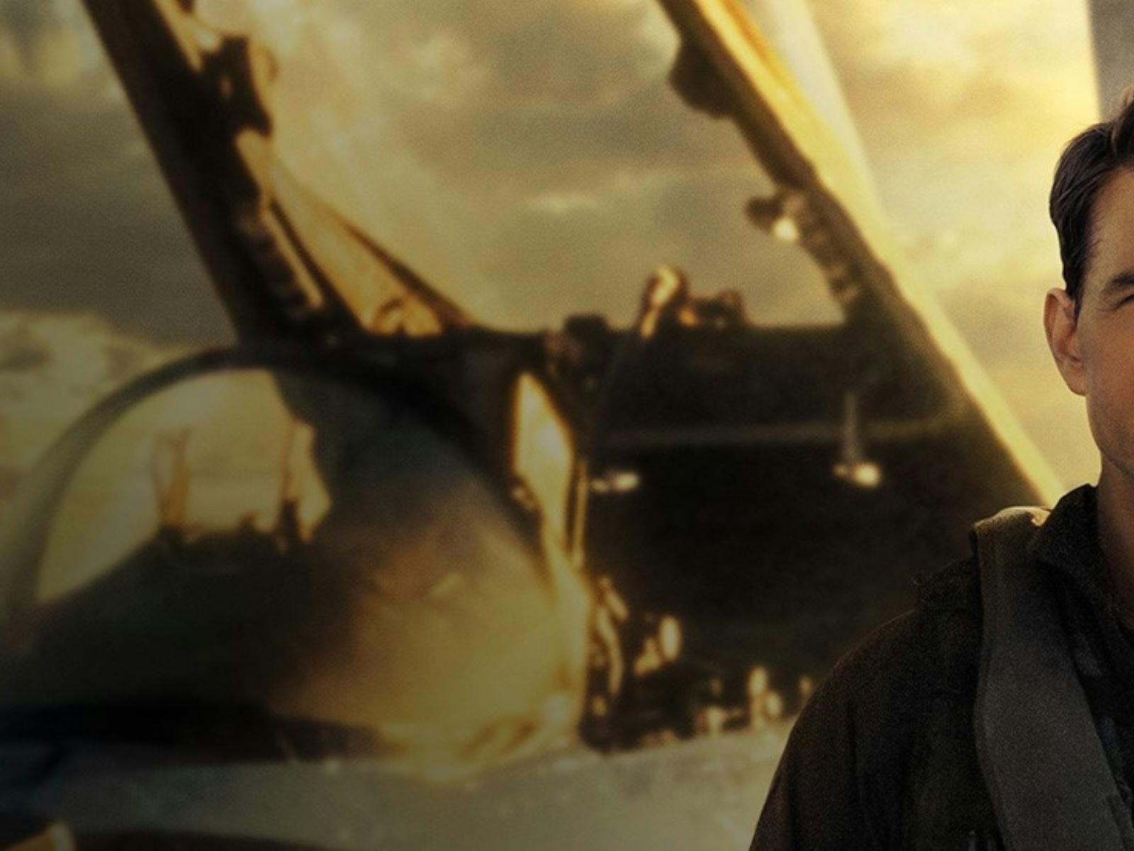 Photo of Tom Cruise in front of an aircraft