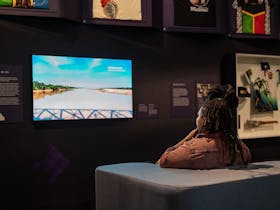 A person watching a digital story