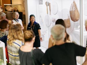 Museum guide leads tour