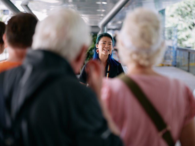 Museum guide leading tour
