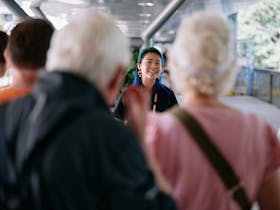 Museum guide leading tour