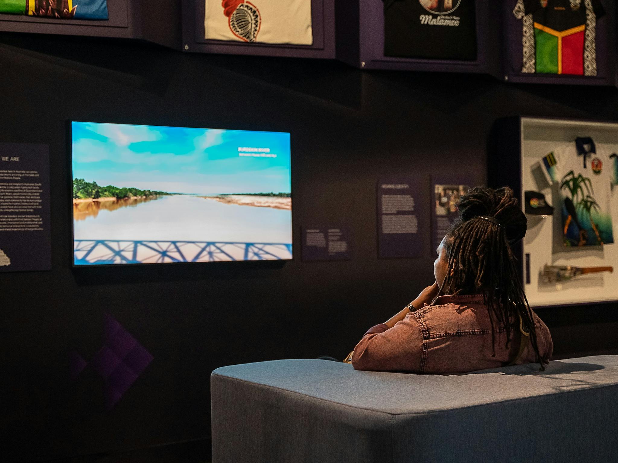 A person watching a digital story