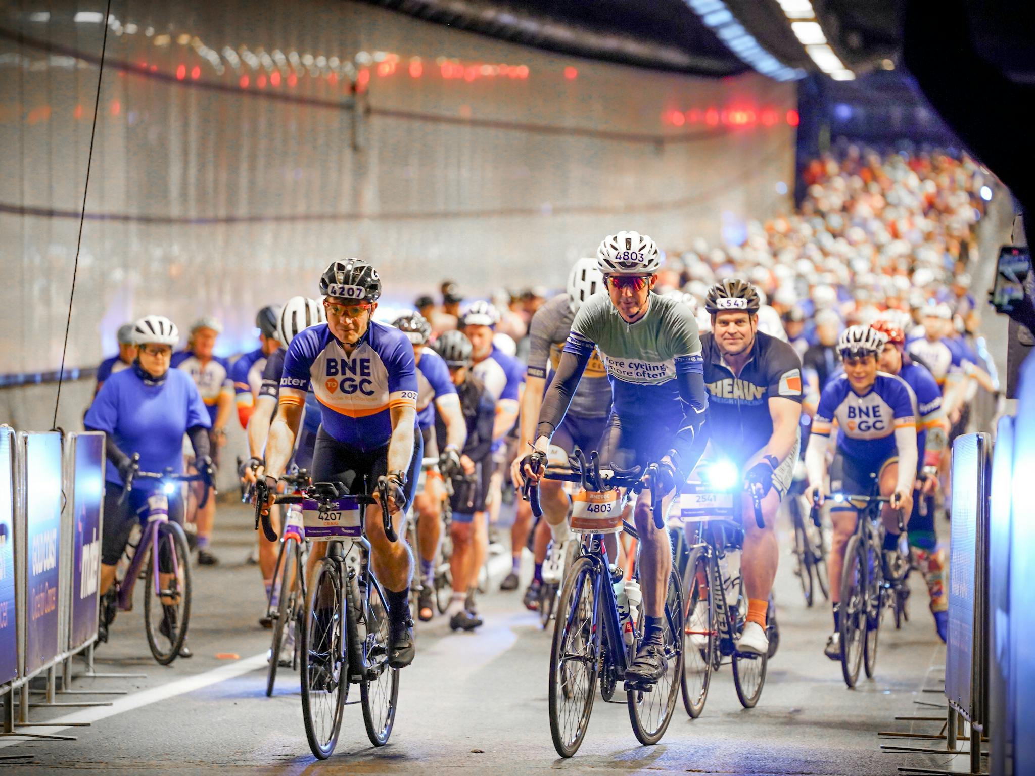 A group of cyclists riding in the South East Busway