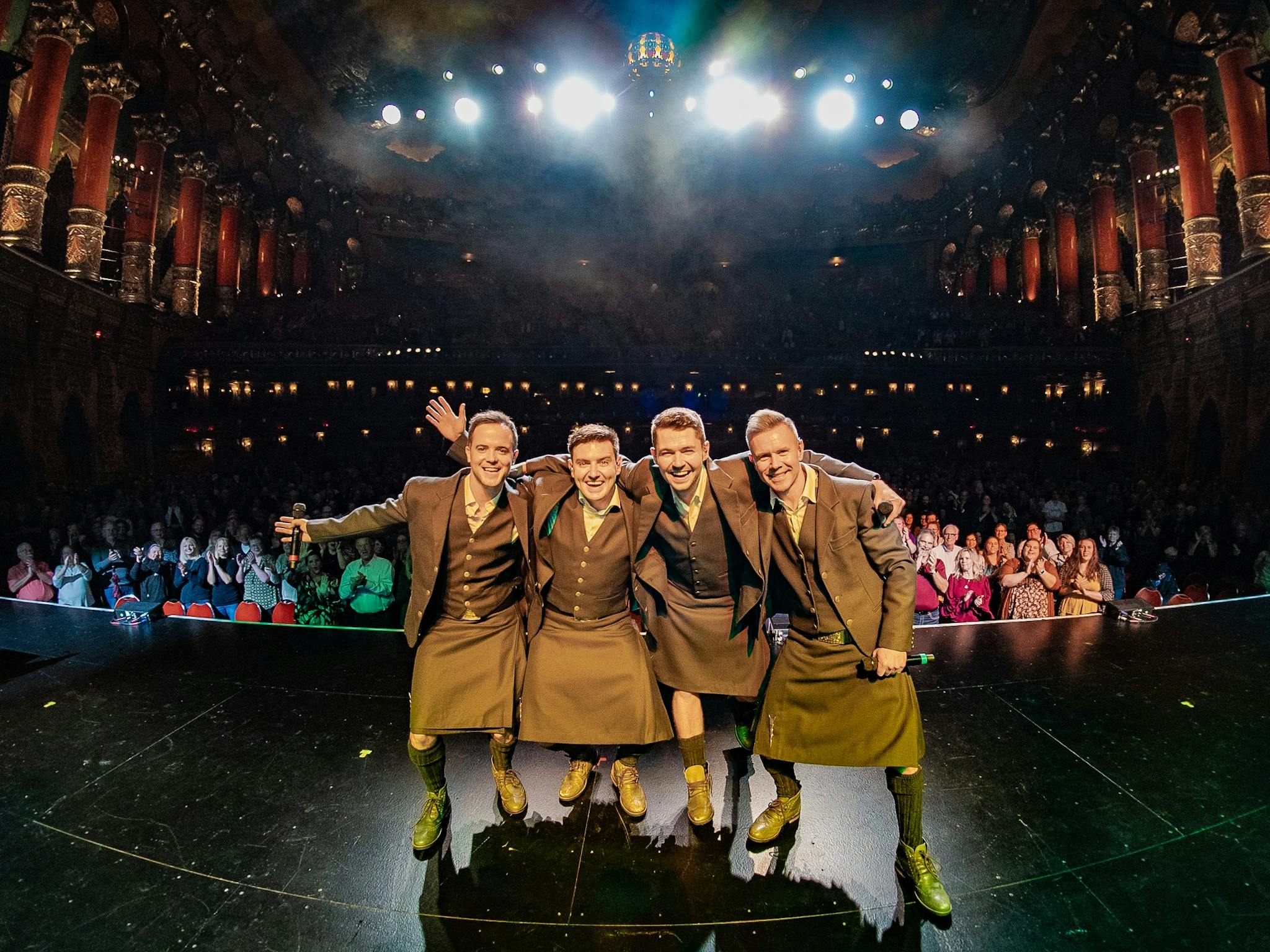 Celtic Thunder smiling on stage