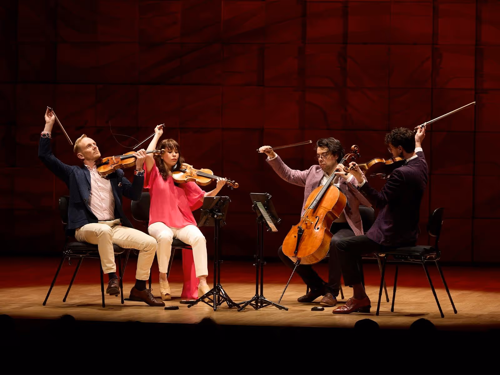 The four members of the Australian String Quartet performing on their Guadagnini instruments.