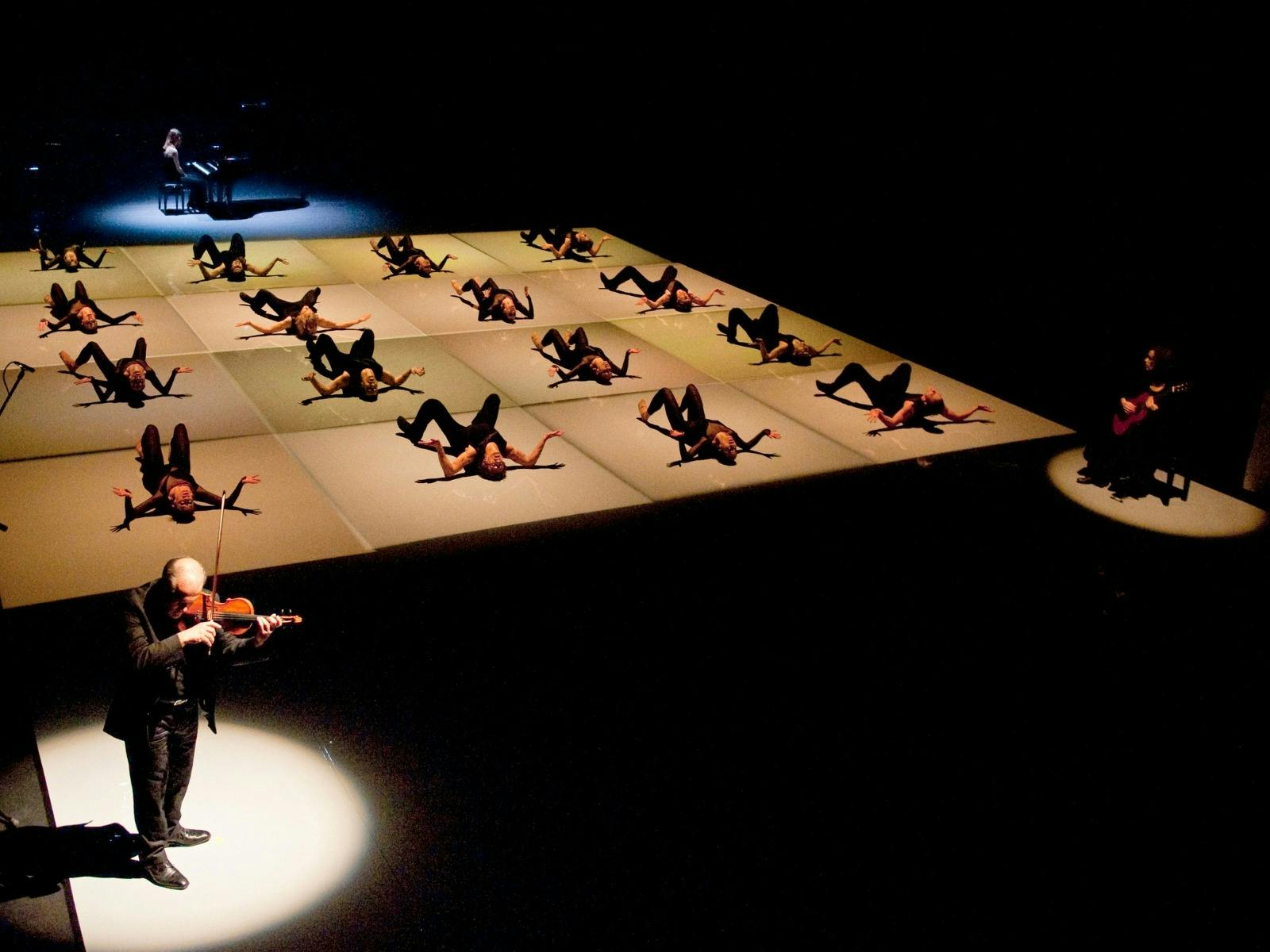 Dancers and musicians on stage.