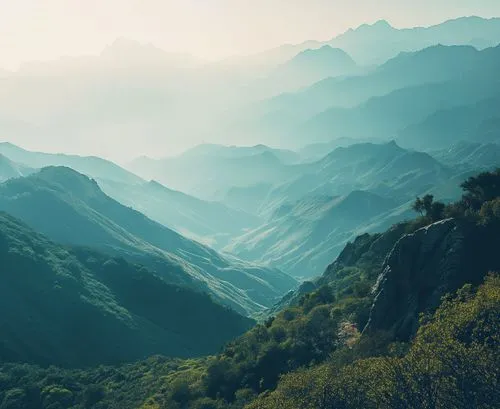 A serene mountain landscape with misty hills, symbolizing the clarity and flexibility of Nimbus Library designs.