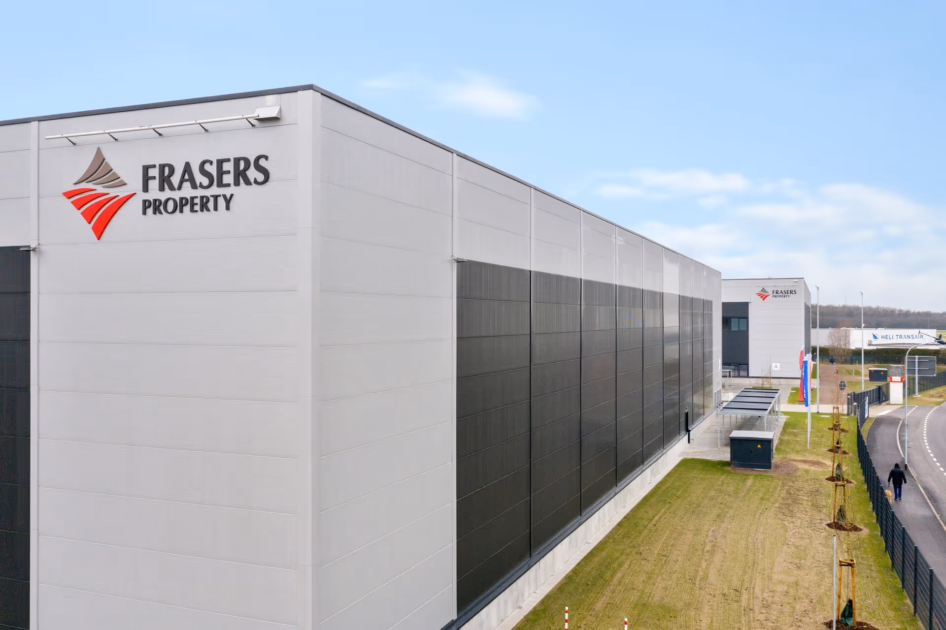 Aerial shot of a warehouse with company logo