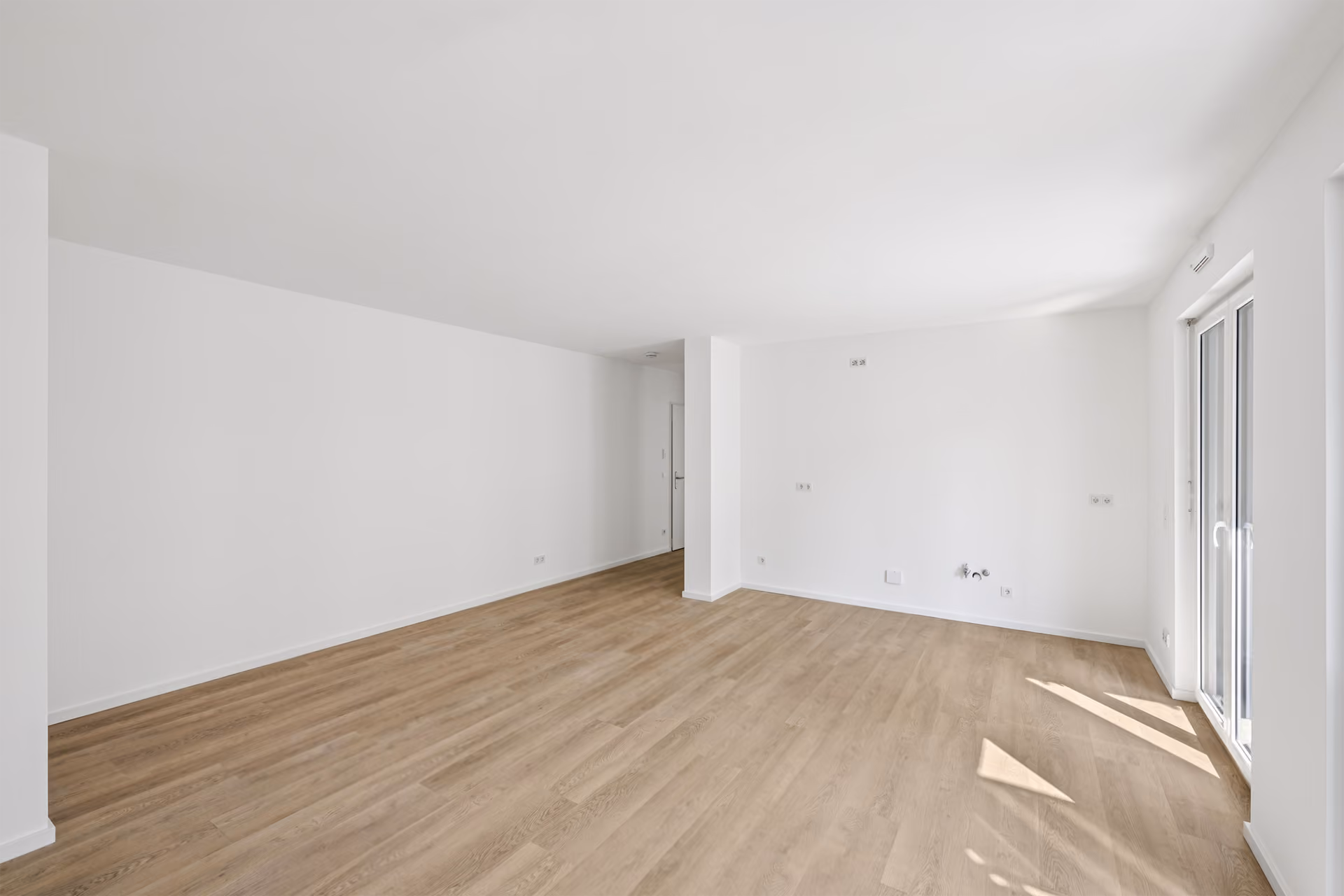 The same living room before staging, empty