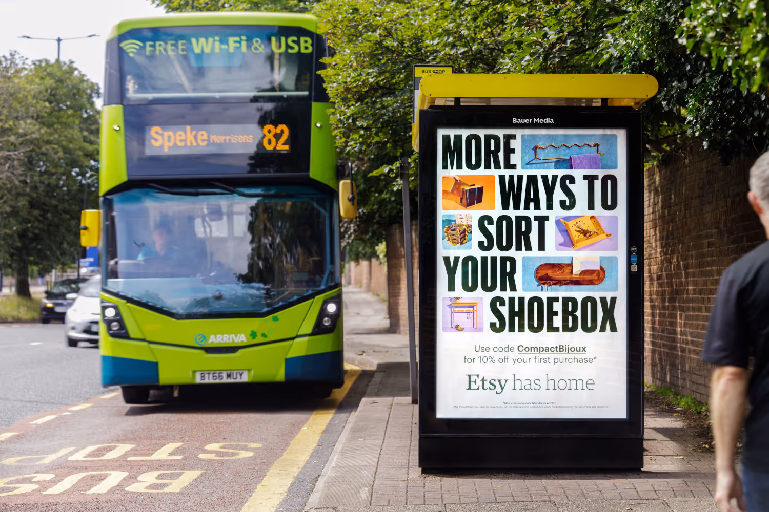 Adshel bus stop poster featuring an Etsy campaign with a bus at the bus stop