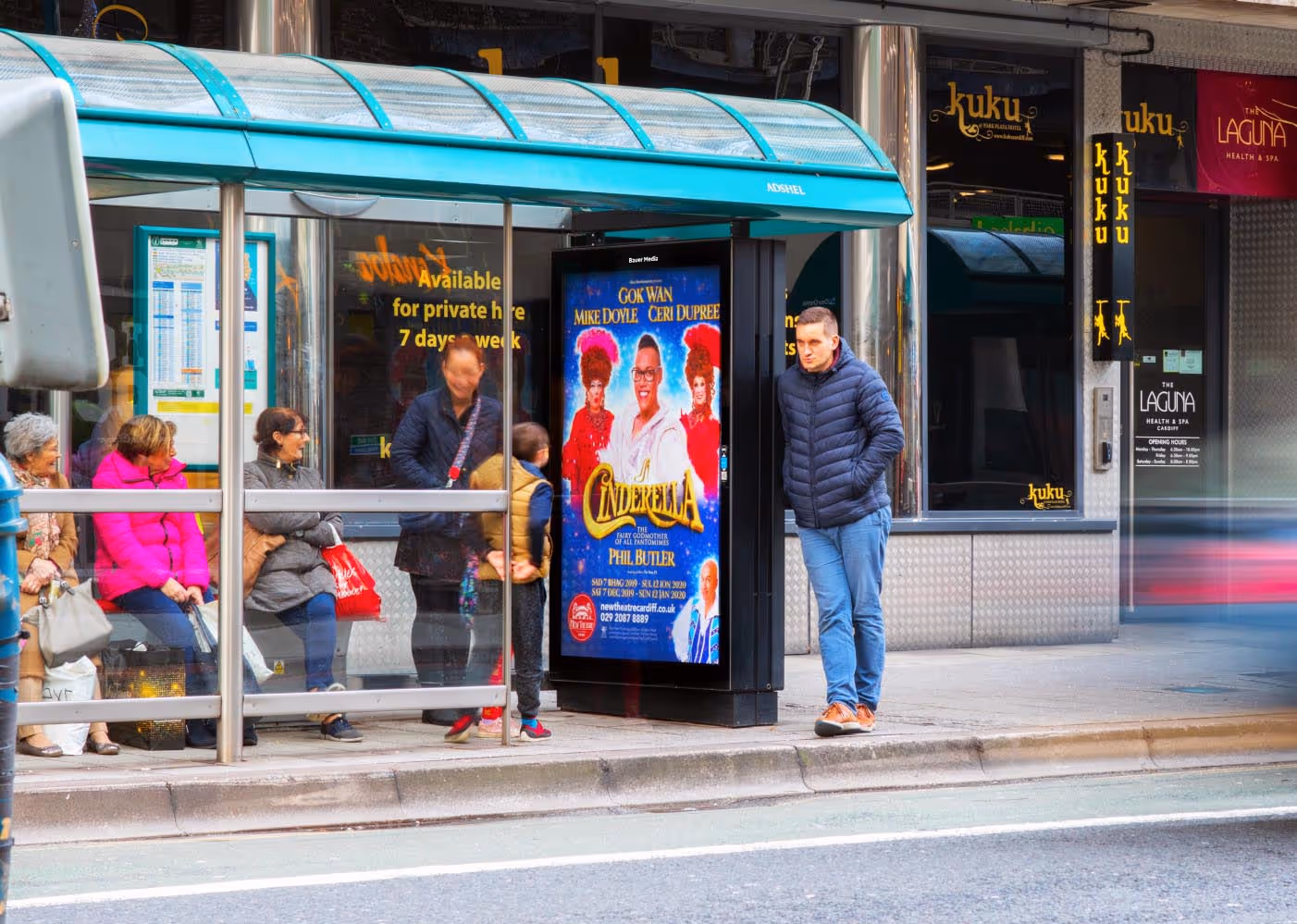 A theatre ad campaign on a bus stop poster