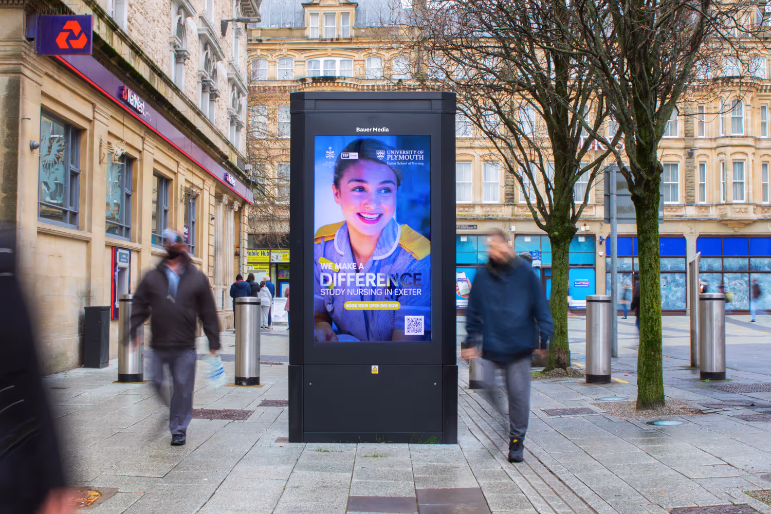 A digital ad screen outside of Natwest displaying Plymouth Uni