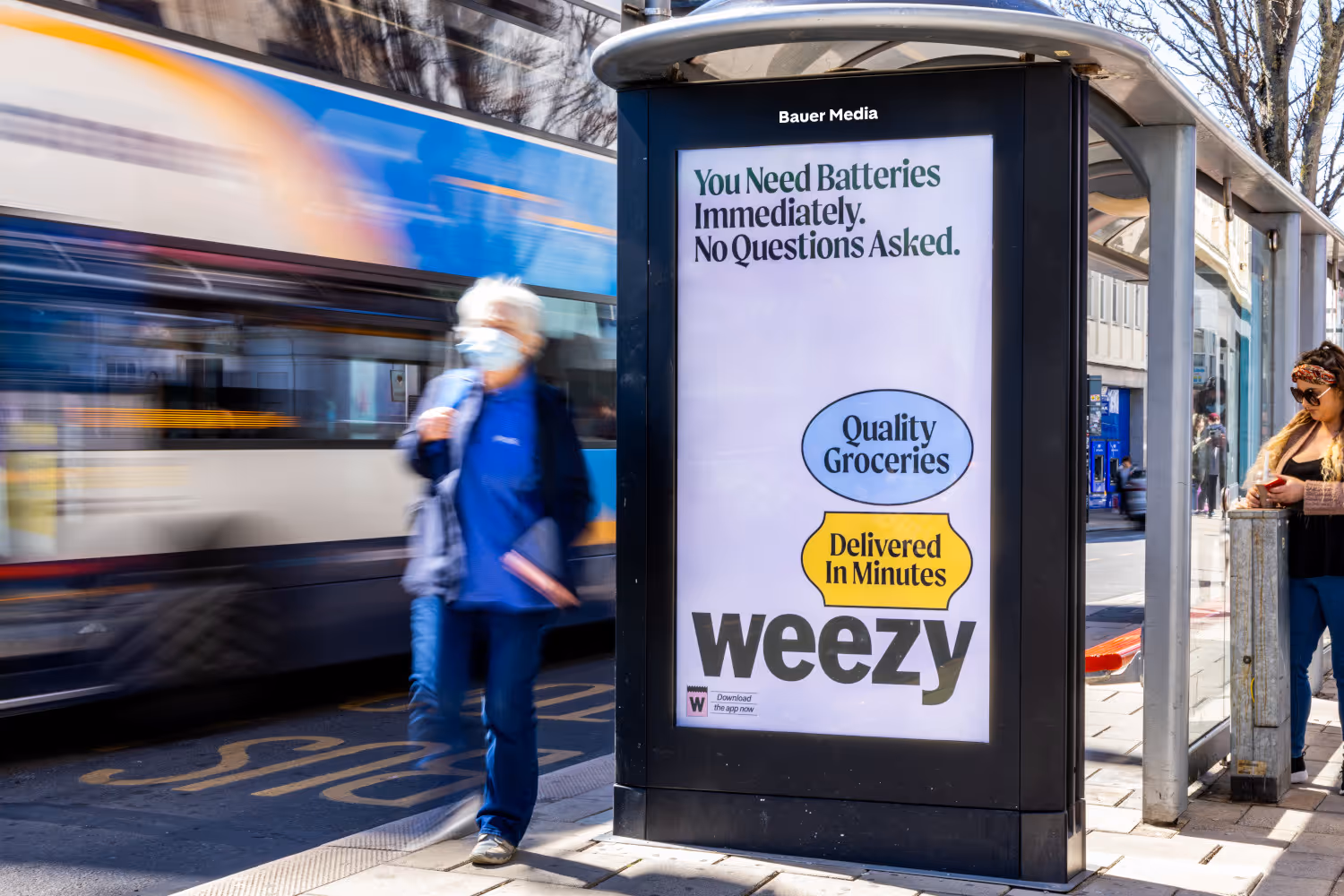 Weezy advertising on a digital bus stop