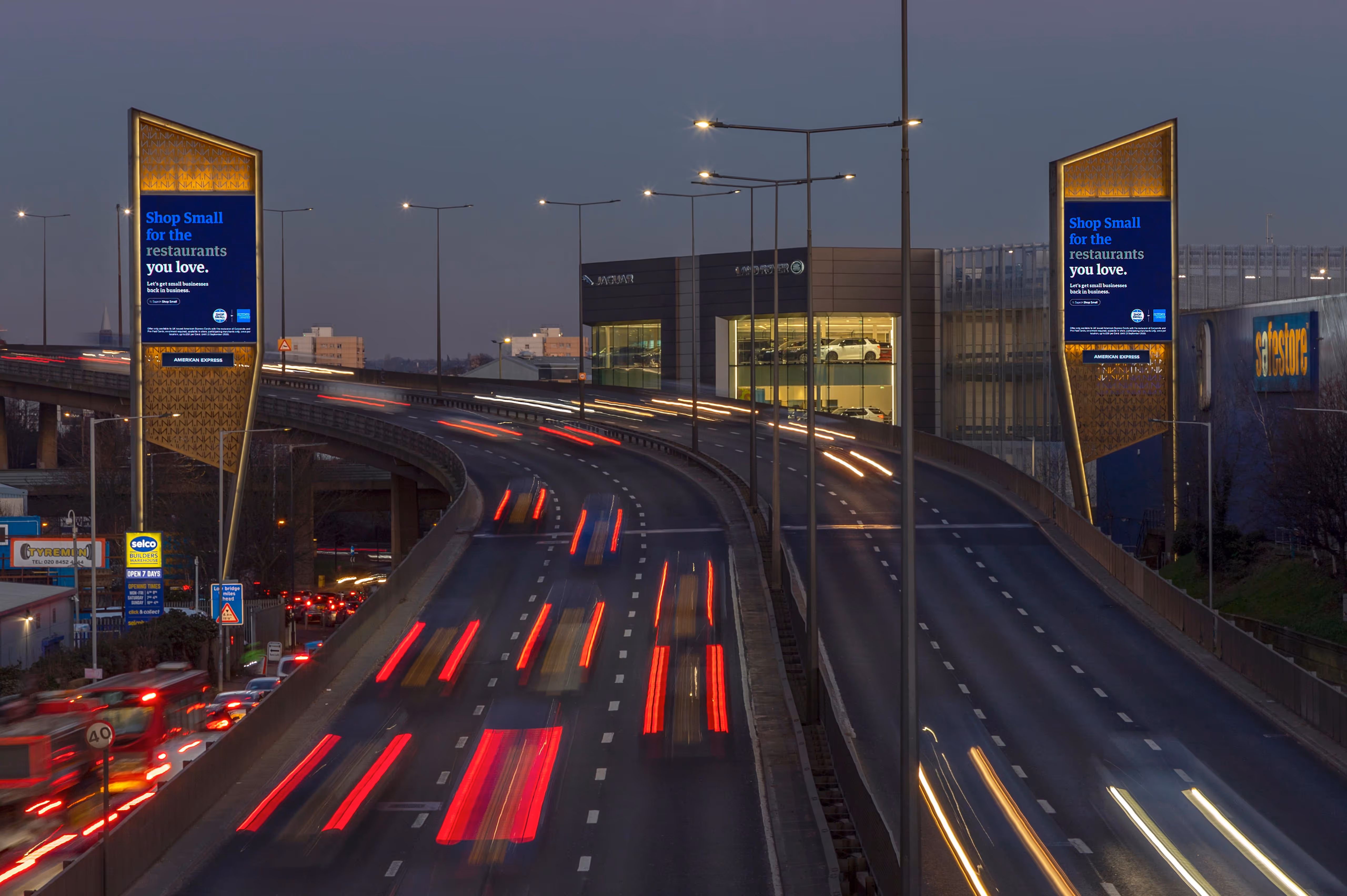 American Express's Storm advertisement at night with lots of motor vehicles driving by
