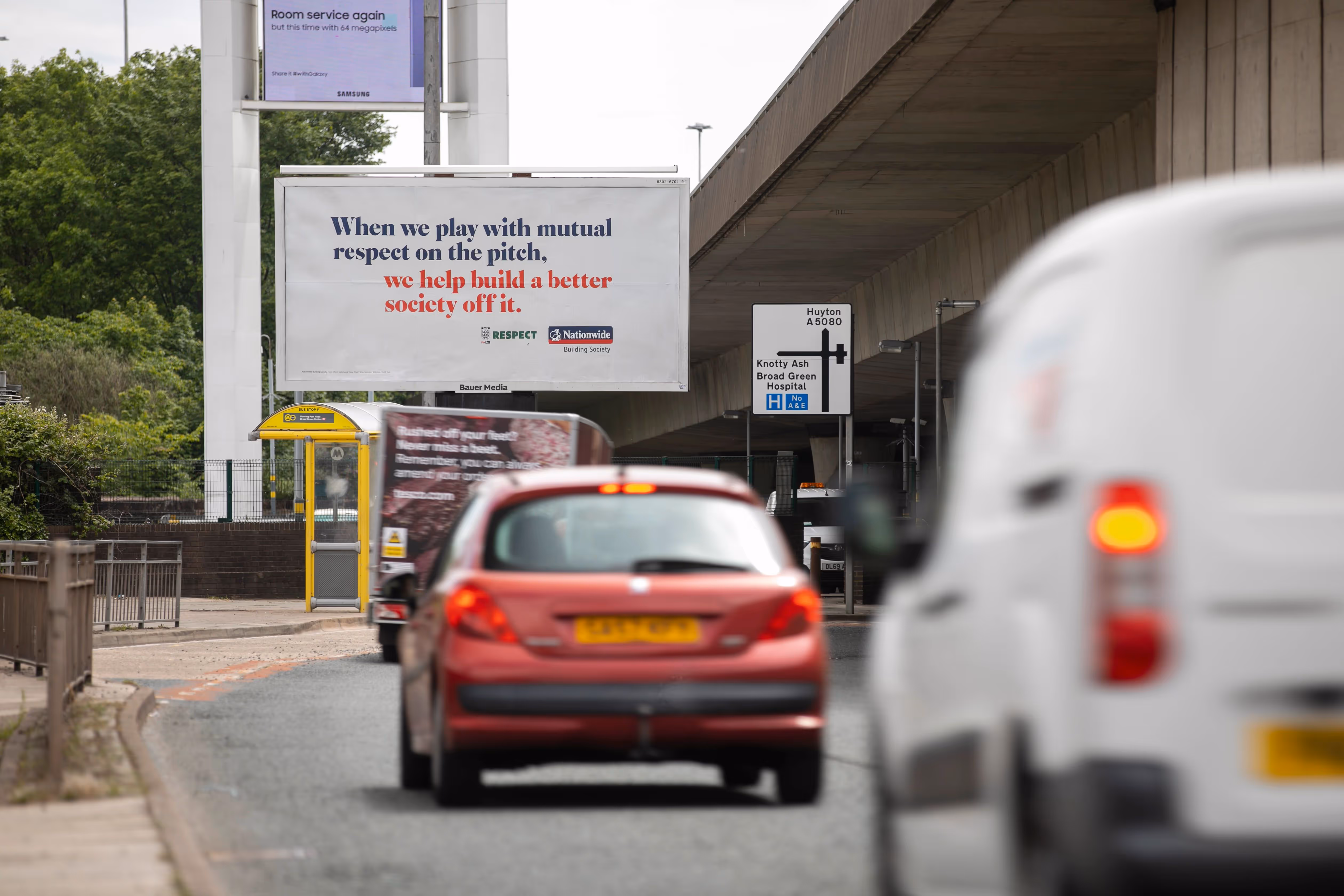 Nationwide's Billboard advertisement with car travellers driving past