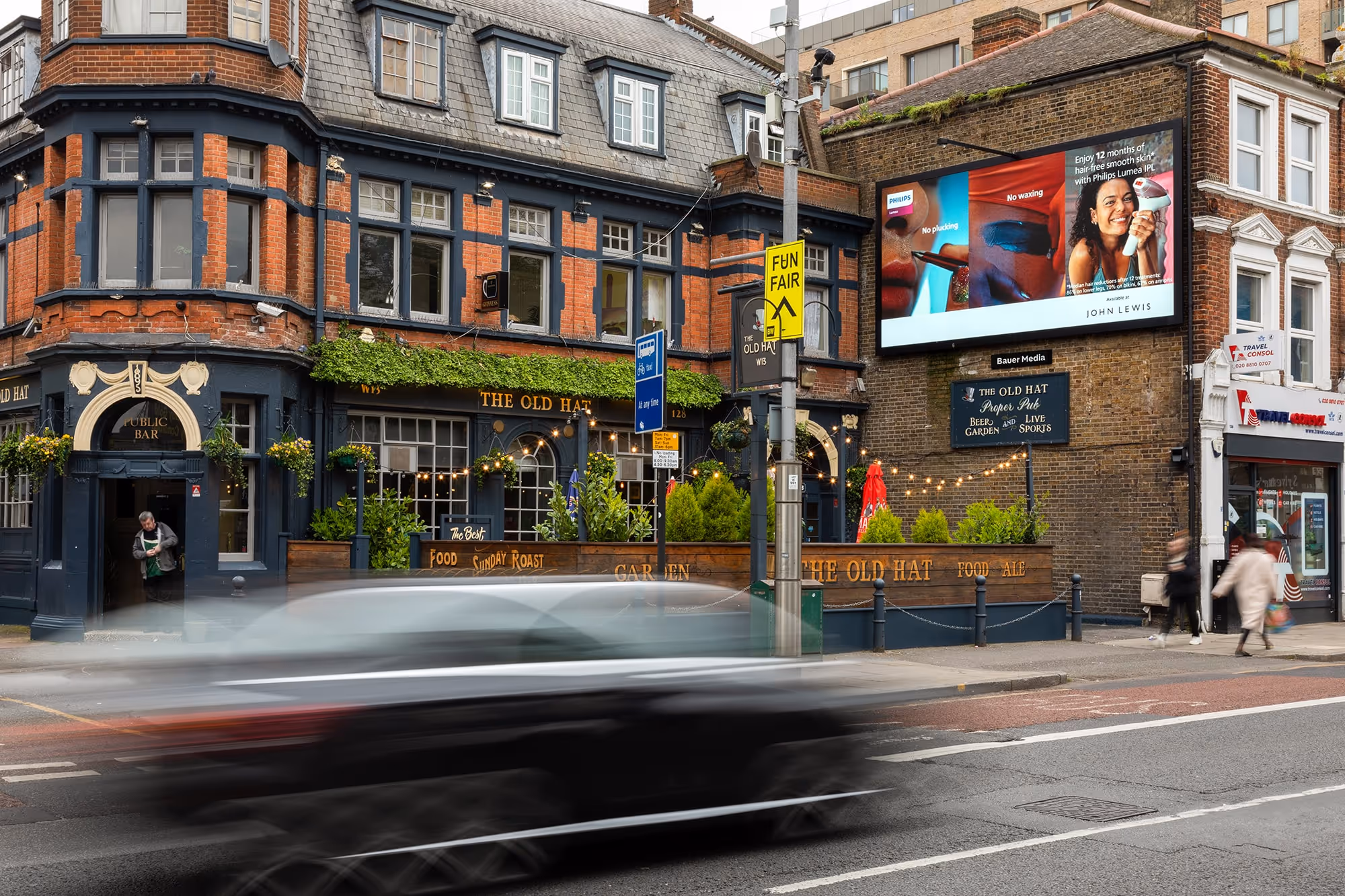 Philips digital billboard campaign on the side of a building