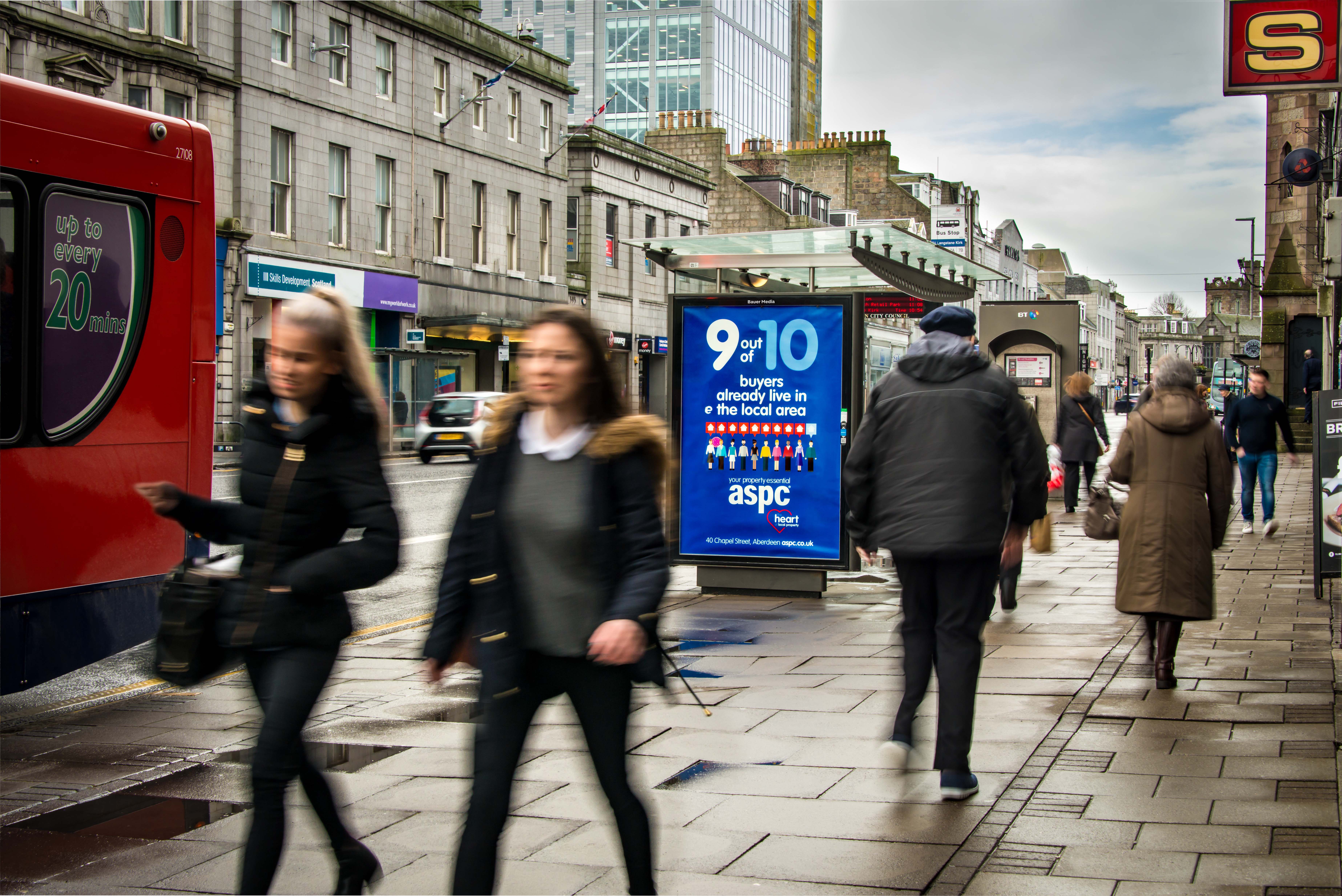 A bus stop poster campaign displaying the aspc