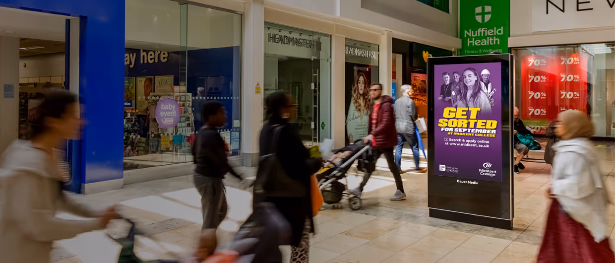 Midkent College ad campaign on a Malls Live screen inside a shopping mall