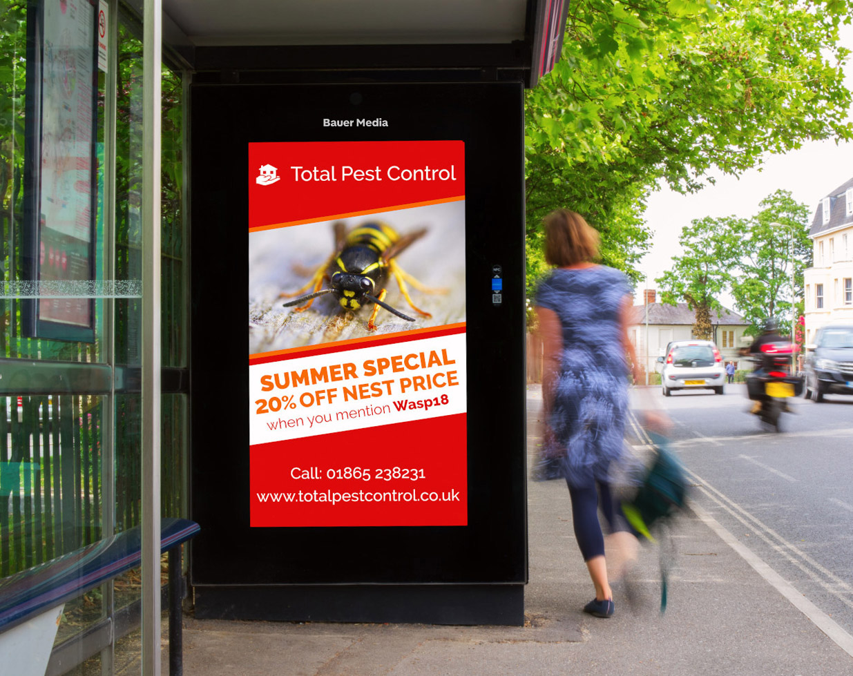Total Pest Control's ad campaign displaying a bee on a digital bus shelter panel