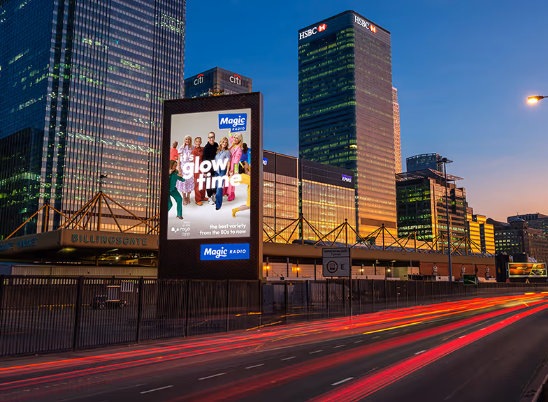 A Magic FM campaign displayed on premium large format digital screen outside Billingsgate market.