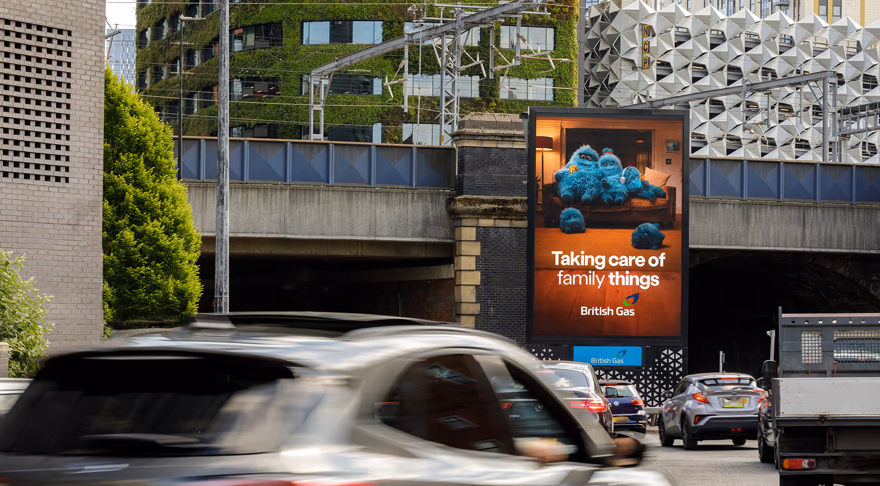 A digital billboard on a busy road in Manchester. It's a British Gas outdoor advert.