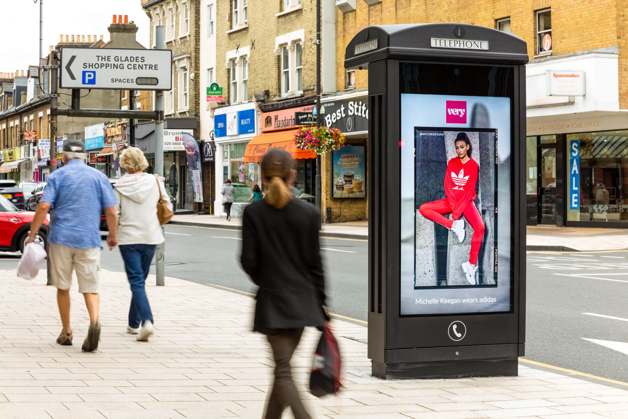 Phone box showing ad for Very